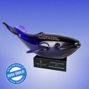blue art glass whale statue award